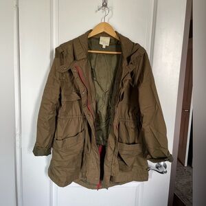 Green Anorak army jacket with red detail